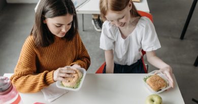 girls sitting at the table